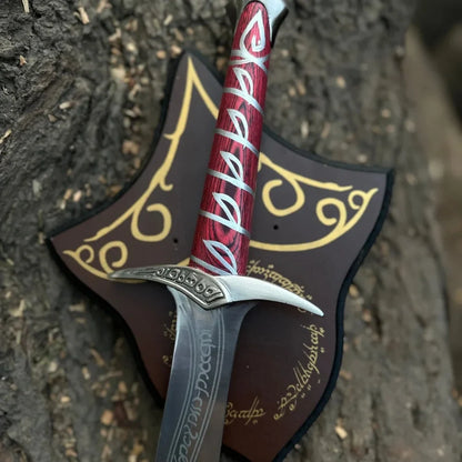 Shiny sword sting prop on medieval backdrop

